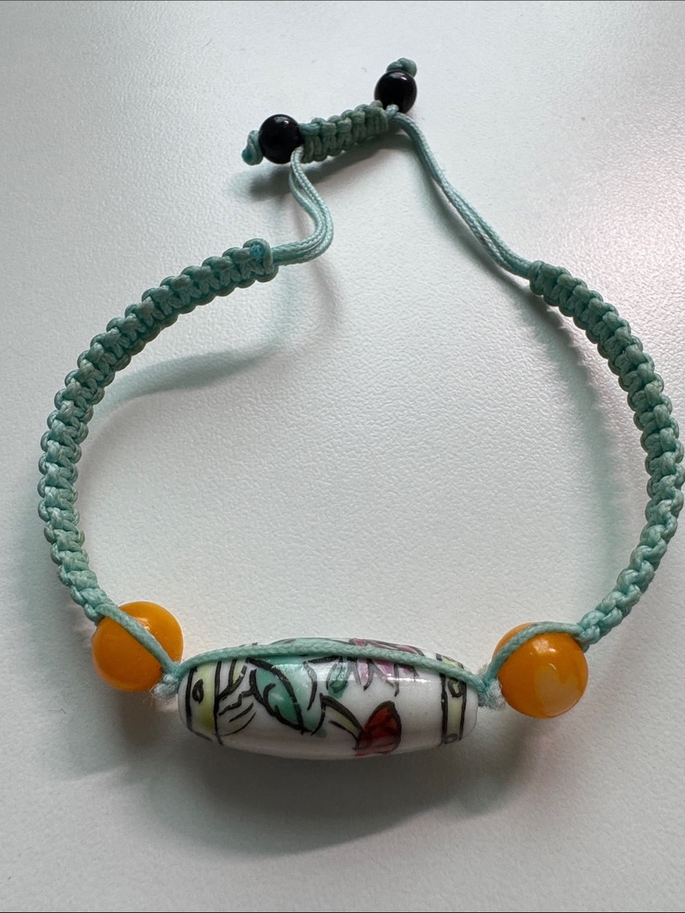 Handcrafted Mint Green Cord Bracelet with Floral Porcelain Bead